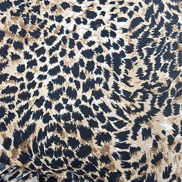 Brown Animal Print Crepe Fabric, laid flat