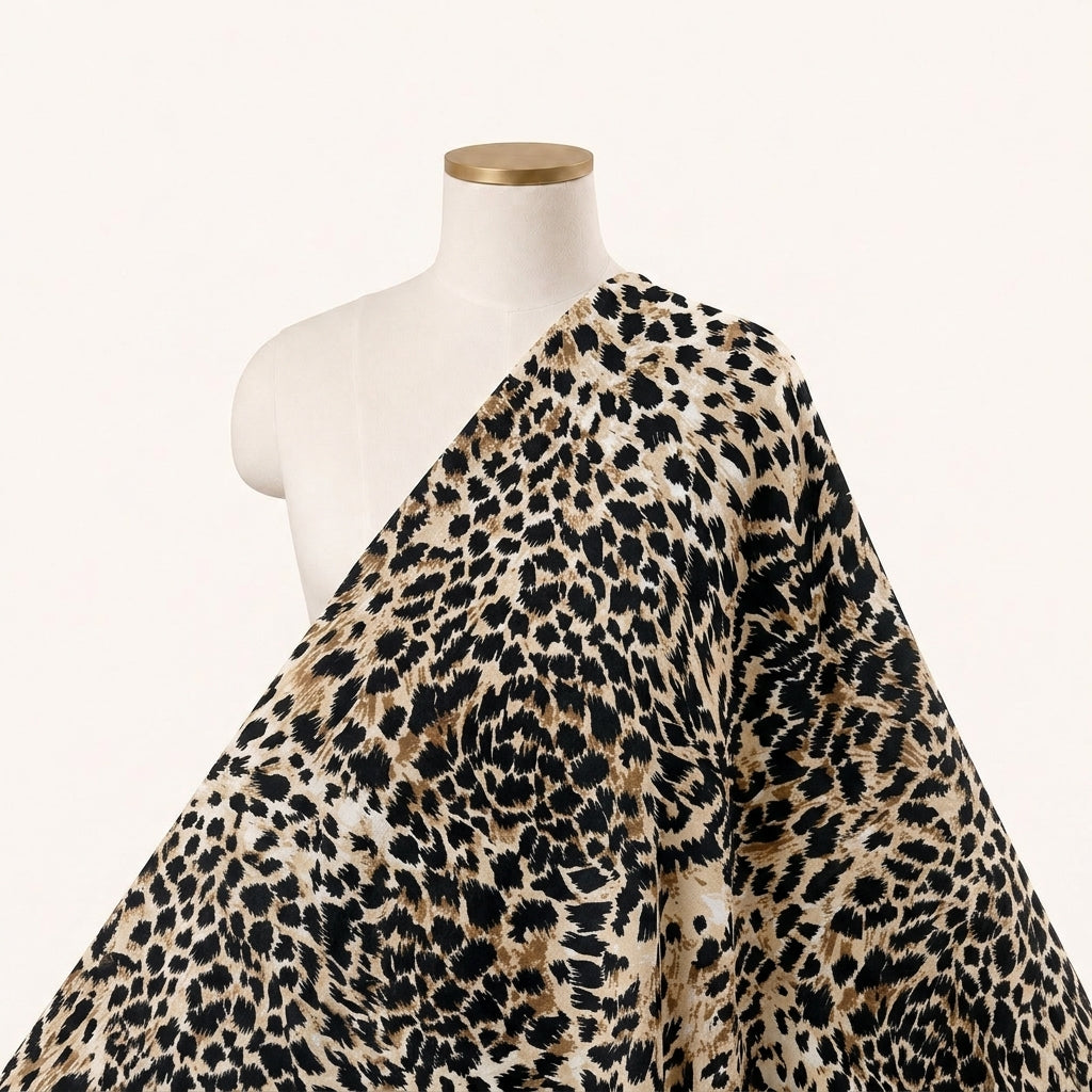 Brown Animal Print Crepe Fabric, draped as a saree