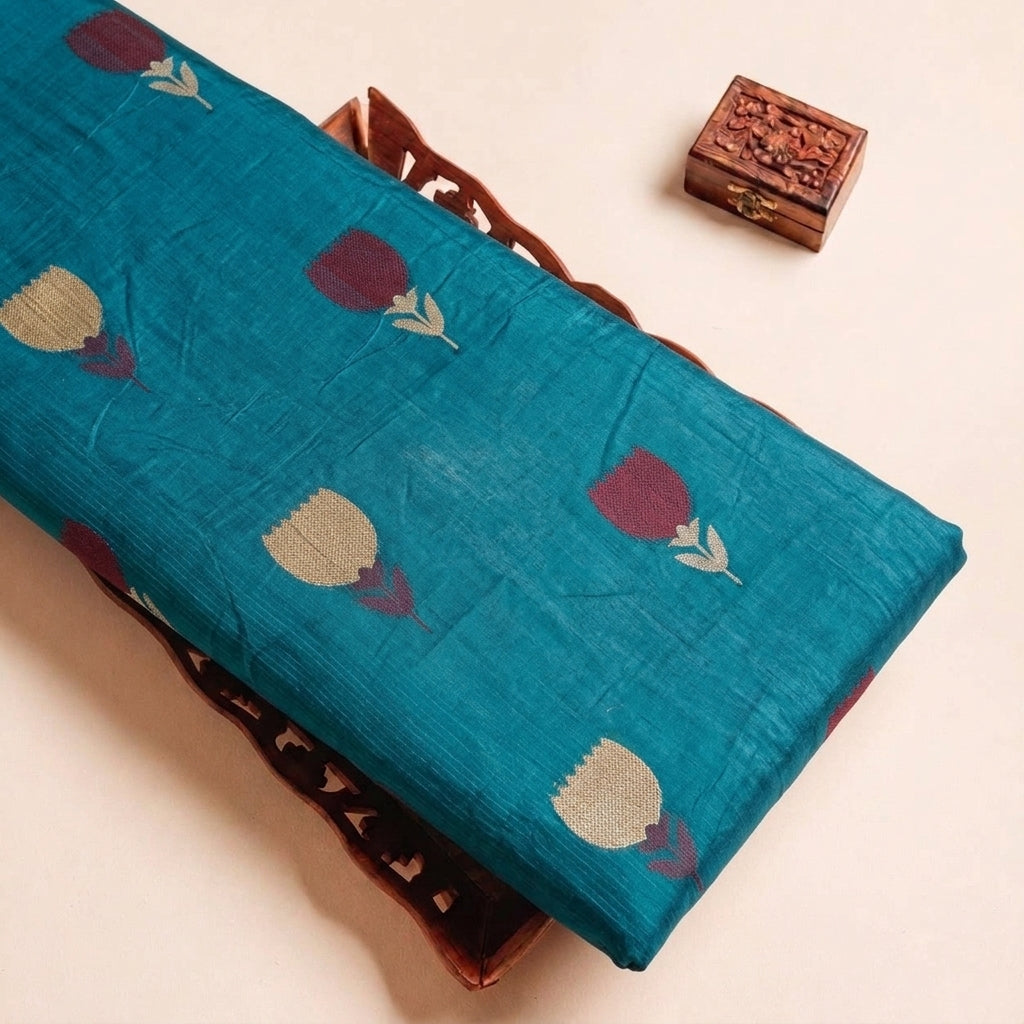 Folded Green Floral Chanderi Fabric Highlighting Zari and Texture