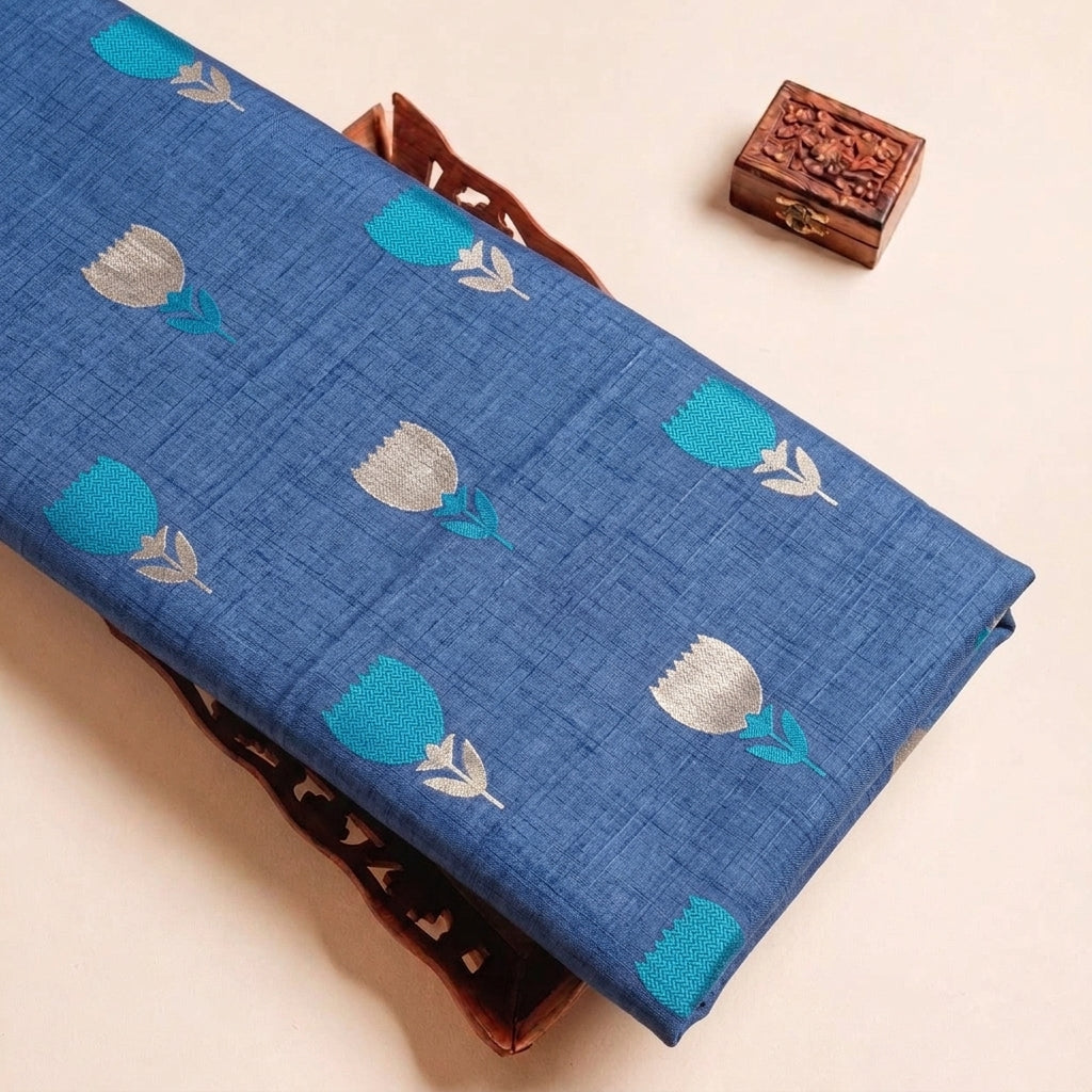 Folded Green Floral Chanderi Fabric Highlighting Zari and Texture