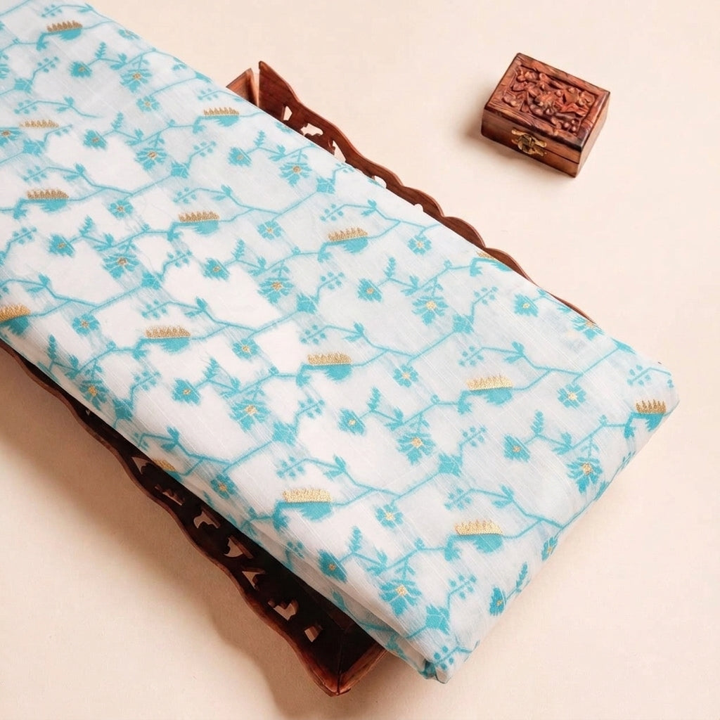 Folded White Floral Chanderi Fabric Highlighting Zari and Texture