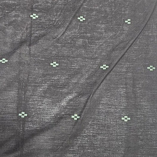 Black Ikat Cotton Fabric, laid flat