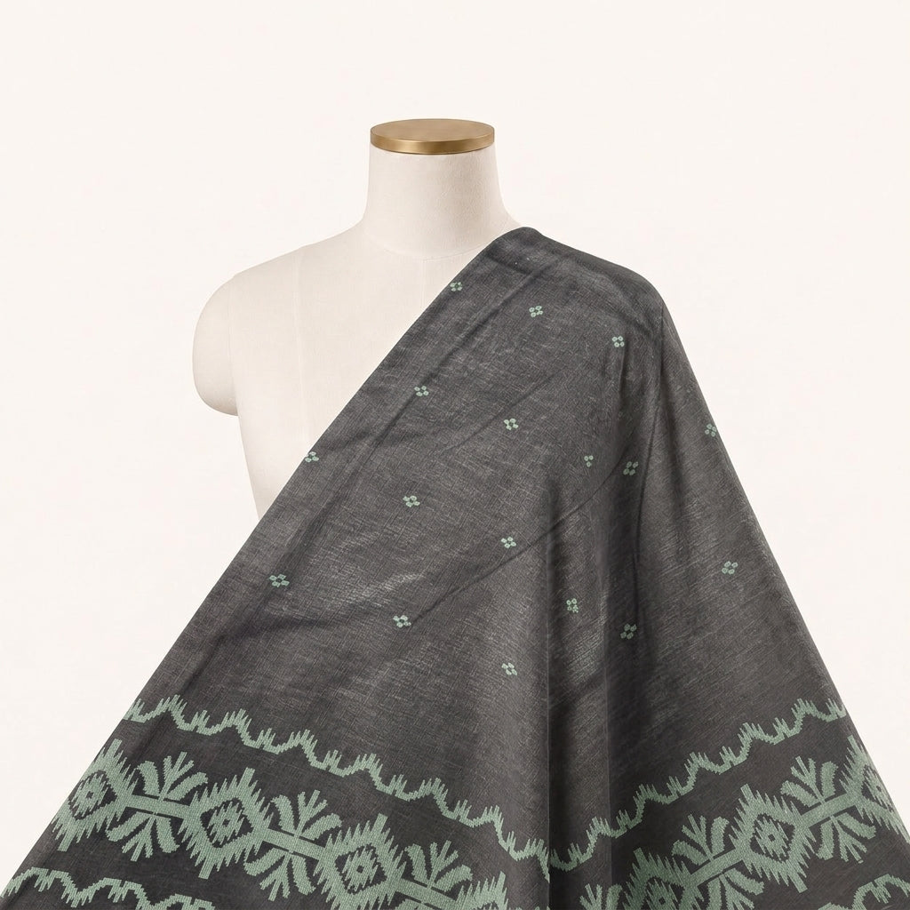 Black Ikat Cotton Fabric Draped as a saree