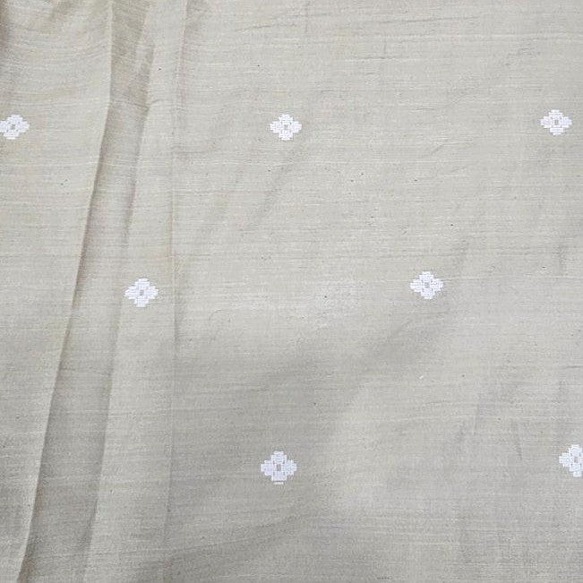 Beige Ikat Cotton Fabric, laid flat