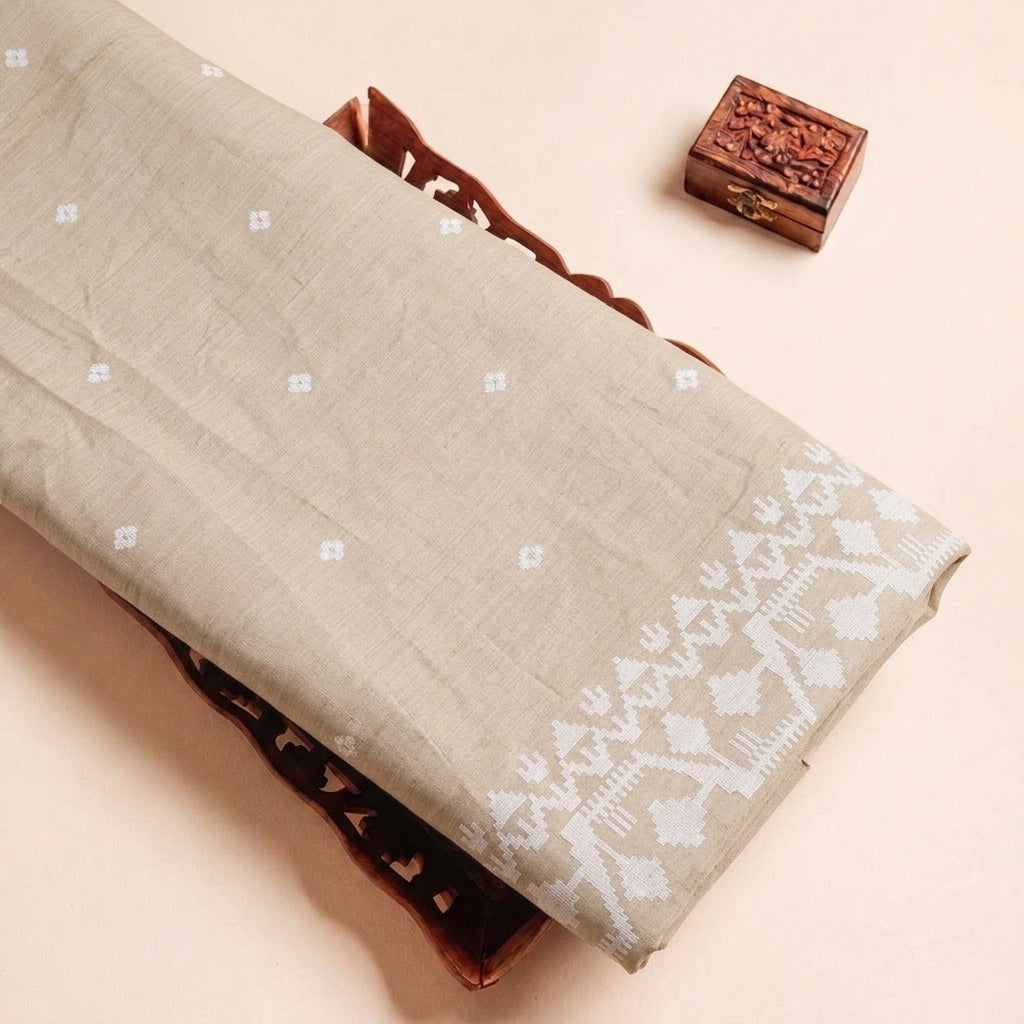 Folded Beige Ikat Cotton Fabric Highlighting Border and Texture