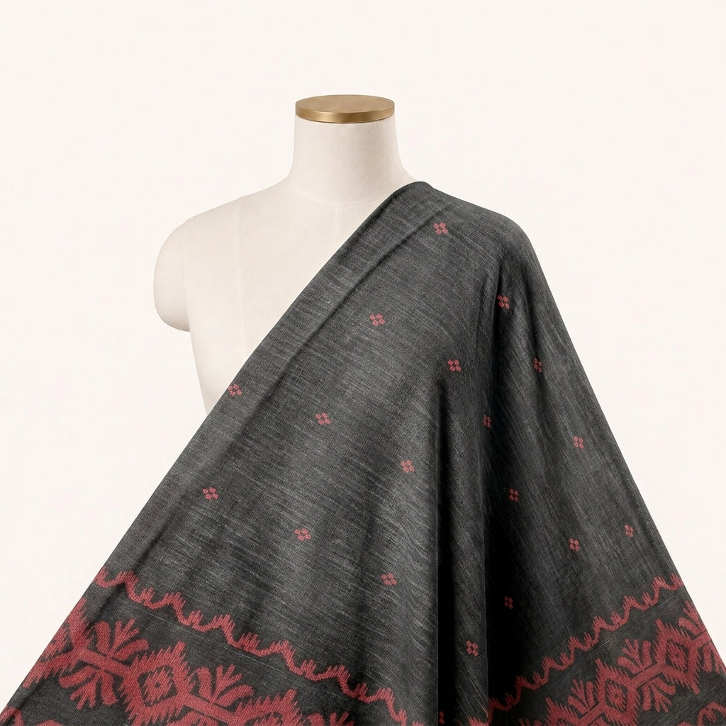 Black Ikat Cotton Fabric Draped as a saree
