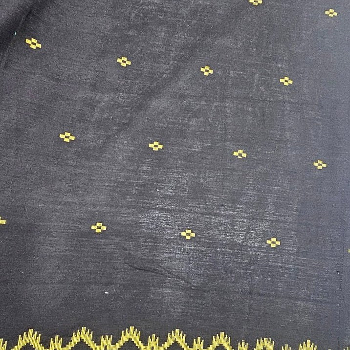 Black Ikat Cotton Fabric, laid flat