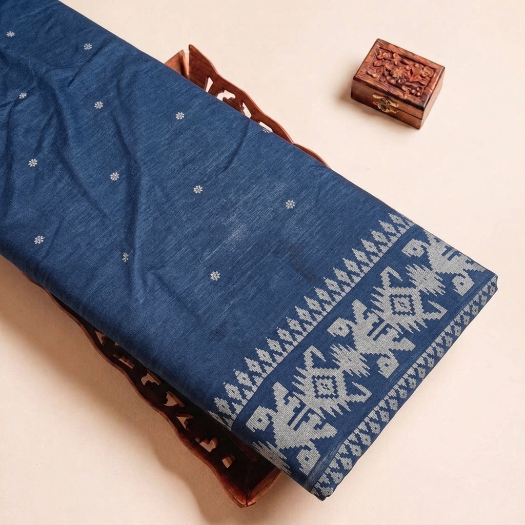 Folded Blue Ikat Cotton Fabric Highlighting Border and Texture