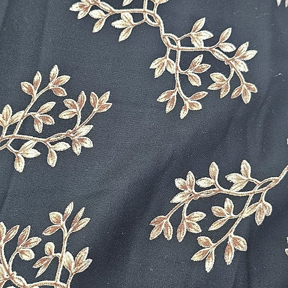 Black Floral Rayon Fabric, laid flat