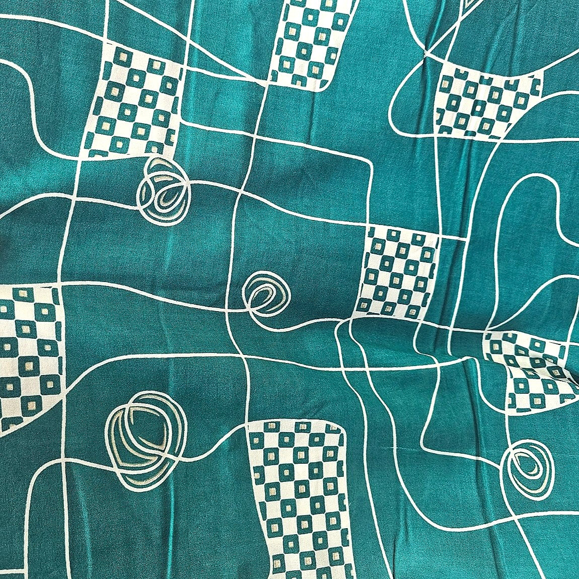 Green Abstract Rayon Fabric, laid flat