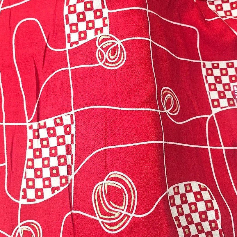 Red Abstract Rayon Fabric, laid flat