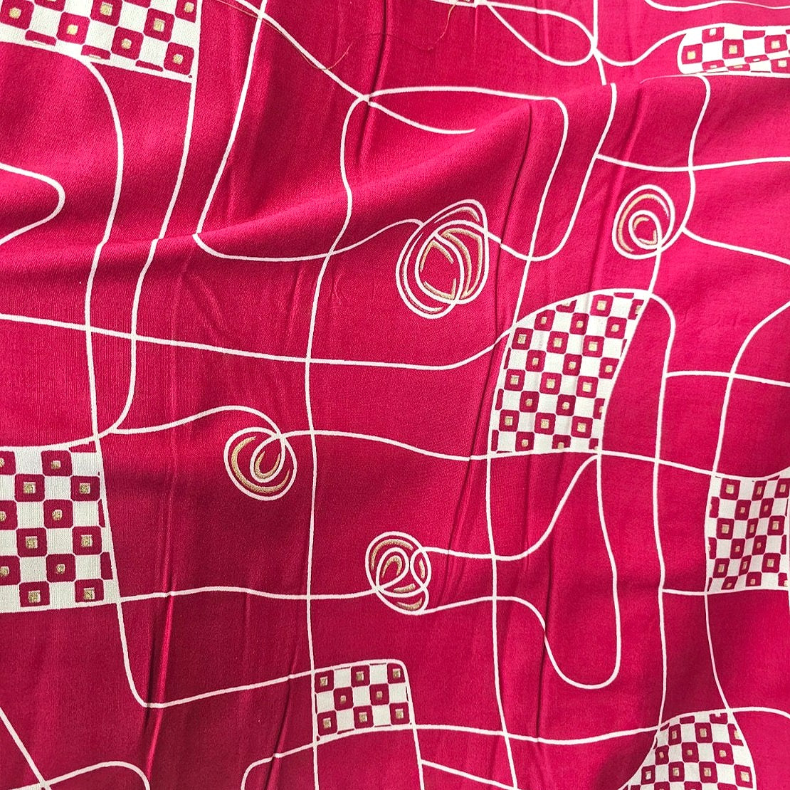 Pink Abstract Rayon Fabric, laid flat
