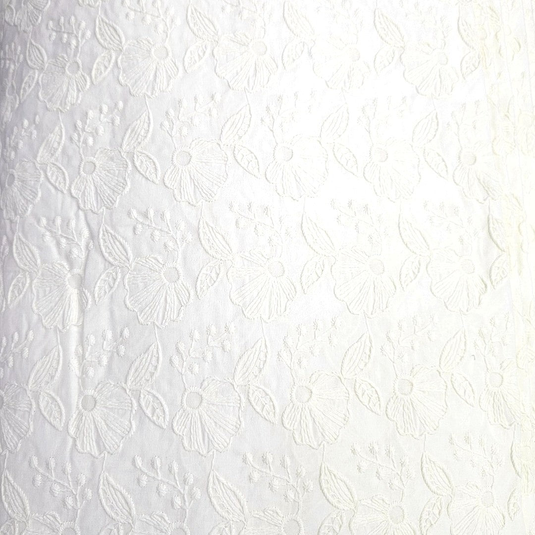 Cream Embroidery Cotton Fabric, laid flat