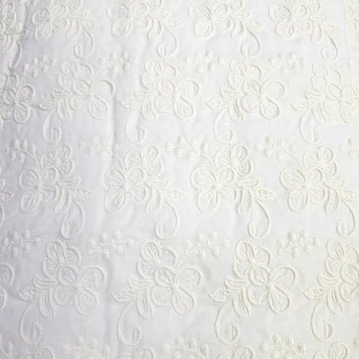 Cream Embroidery Cotton Fabric, laid flat