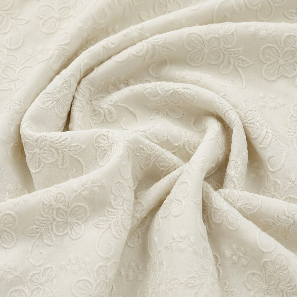 Swirled Cream Embroidery Cotton Fabric Showing Thread Work Border Floral and Drape