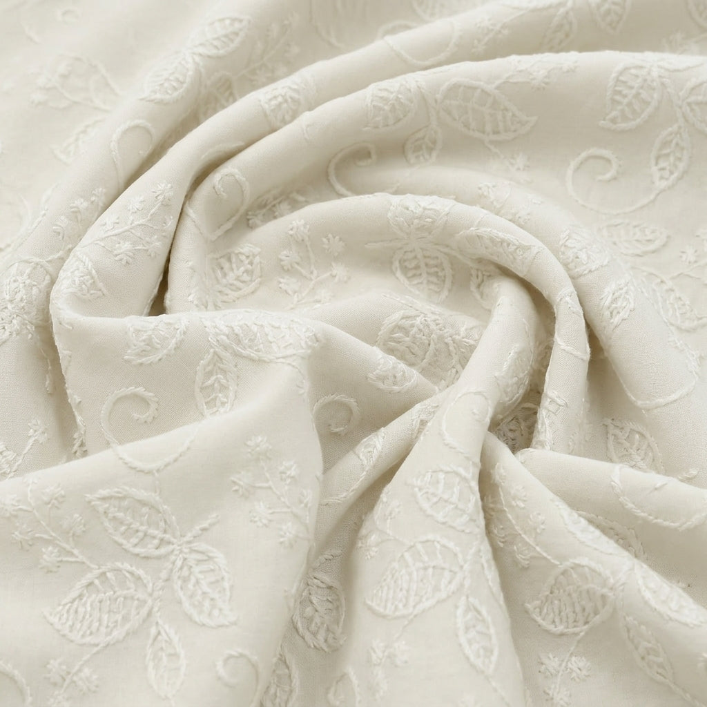 Swirled Cream Embroidery Cotton Fabric Showing Thread Work Border Floral and Drape