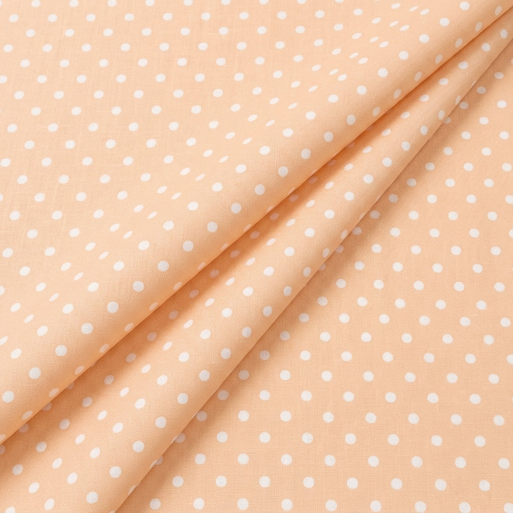 Folded Light Peach Polka Dots Cotton Fabric