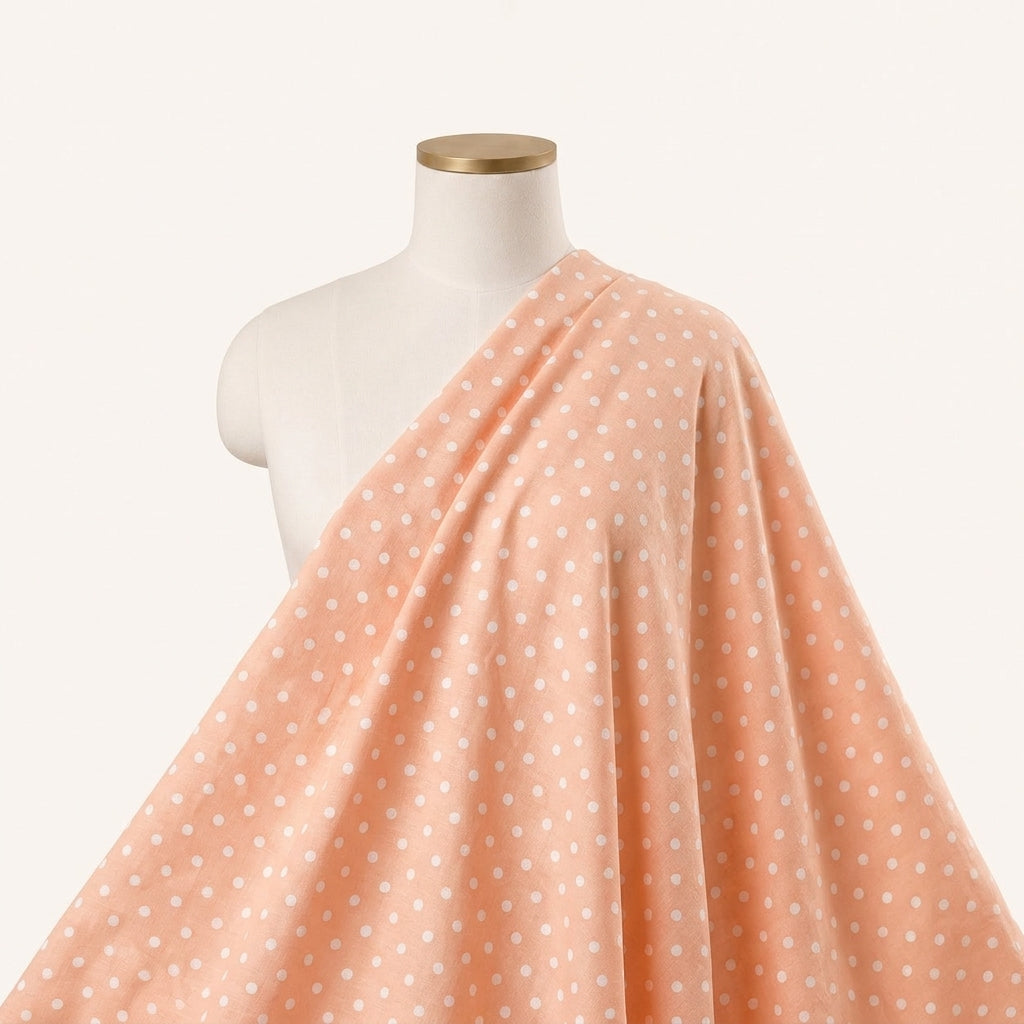 Light Peach Polka Dots Cotton Fabric Draped as a saree
