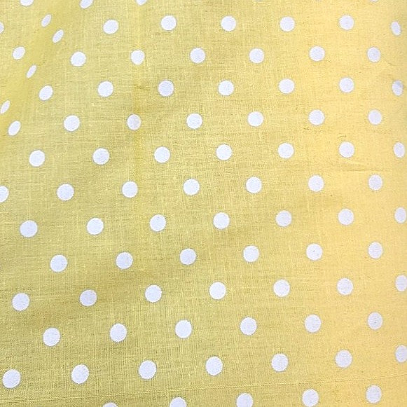 Yellow Polka Dots Cotton Fabric, laid flat