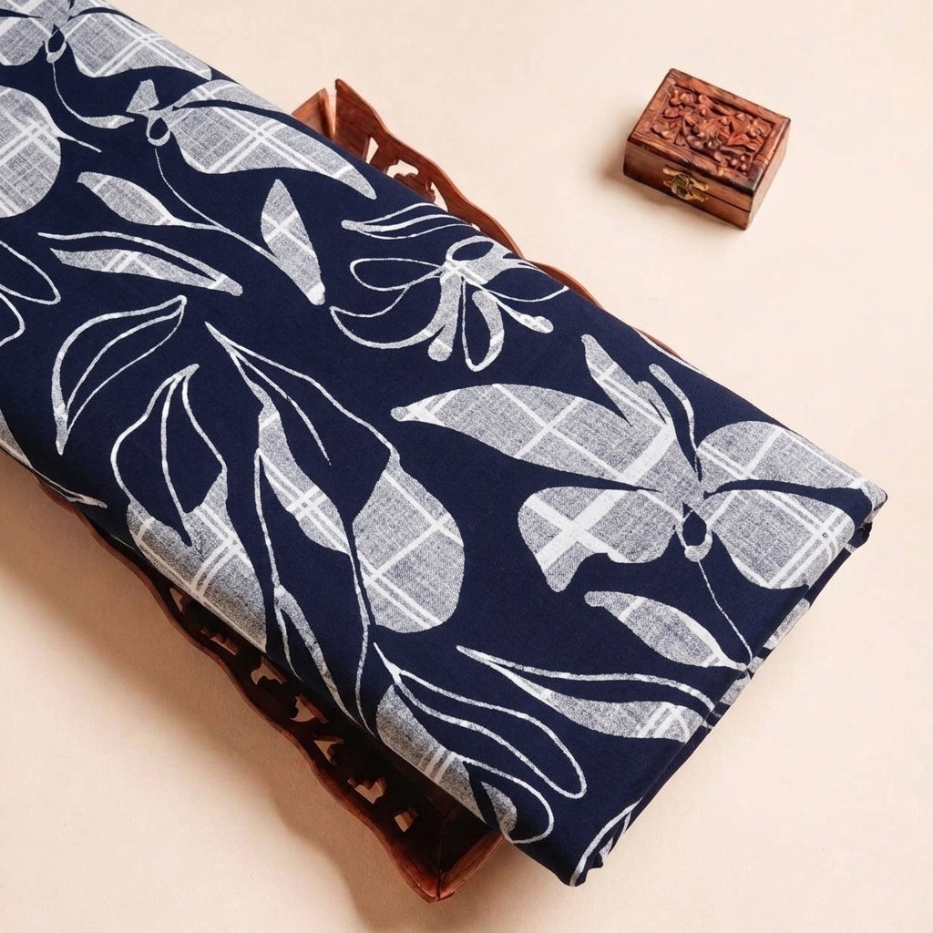 Folded Navy Blue Leaf Rayon Fabric Highlighting Texture