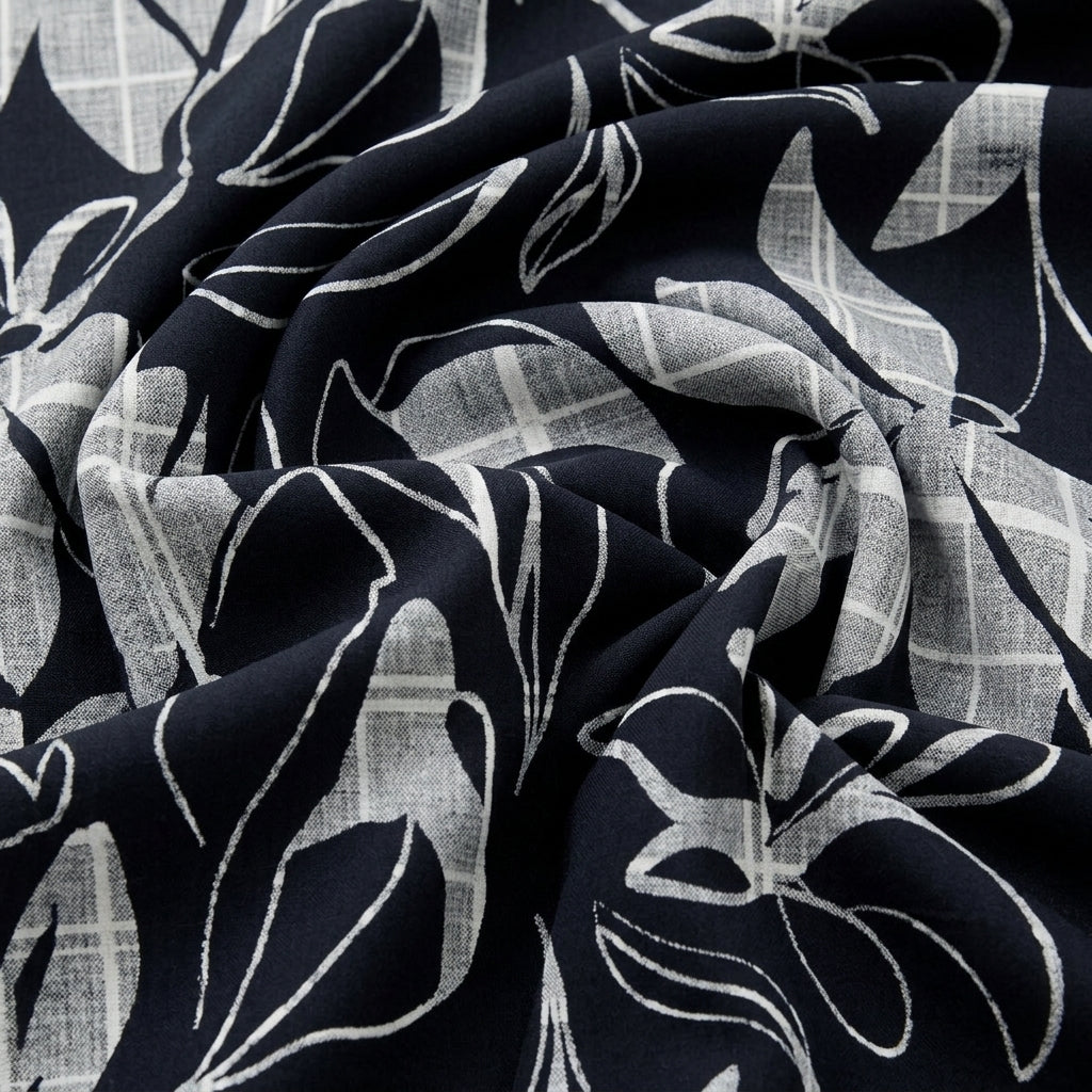 Swirled Black Leaf Rayon Fabric Showing Drape