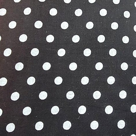 Black Polka Dots Cotton Fabric, laid flat
