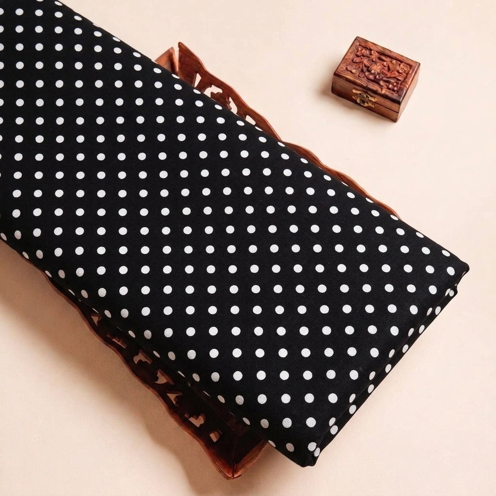 Folded Black Polka Dots Cotton Fabric Highlighting Texture