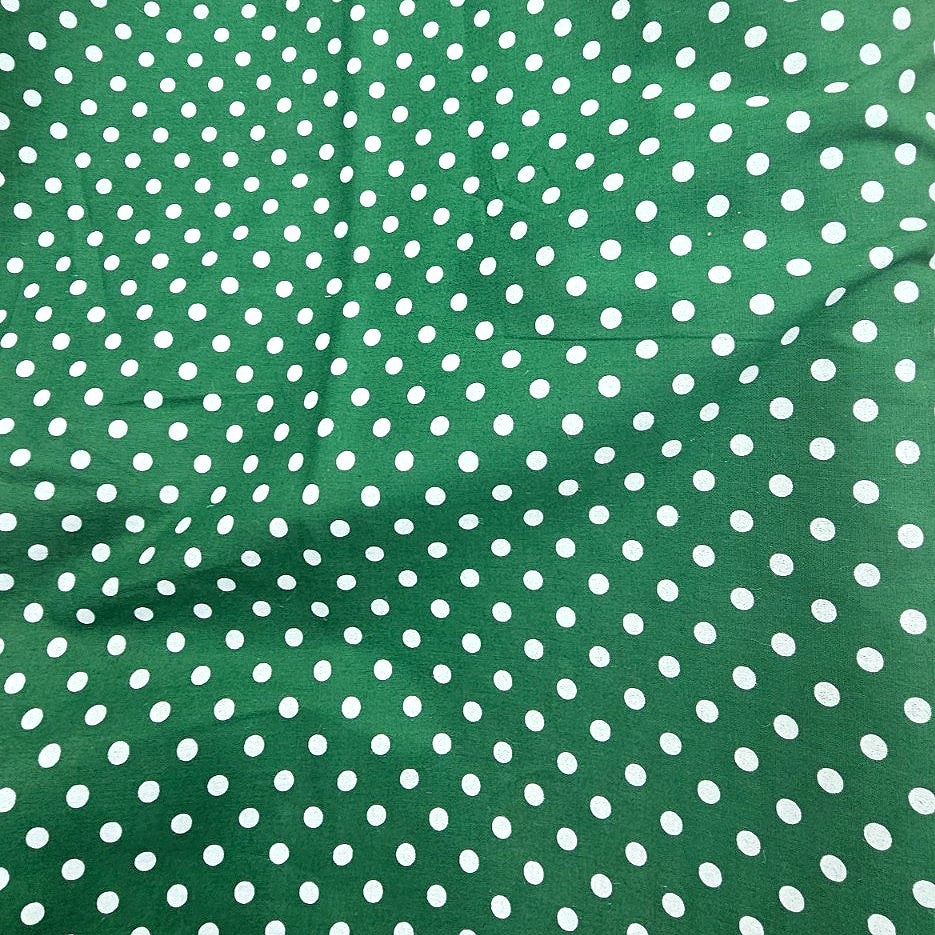 Green Polka Dots Cotton Fabric, laid flat