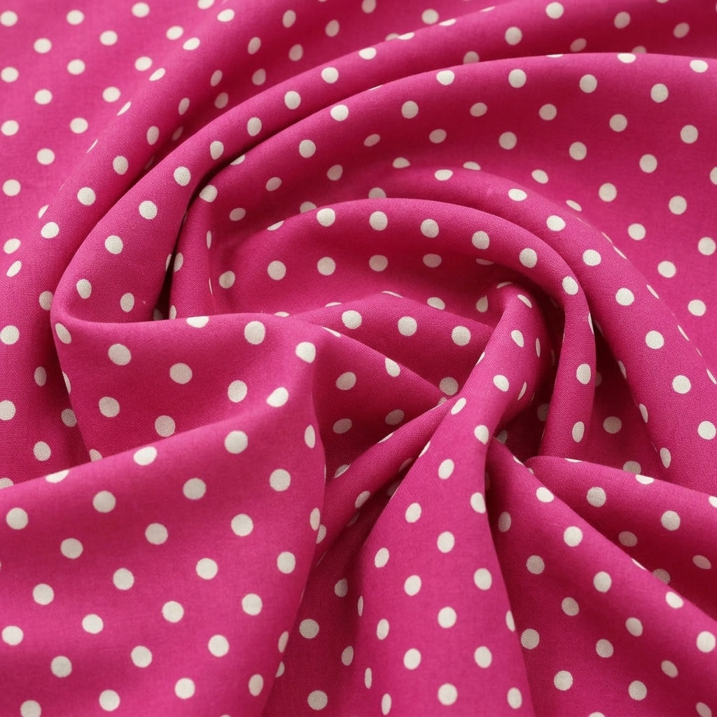 Swirled Pink Polka Dots Cotton Fabric Showing Drape