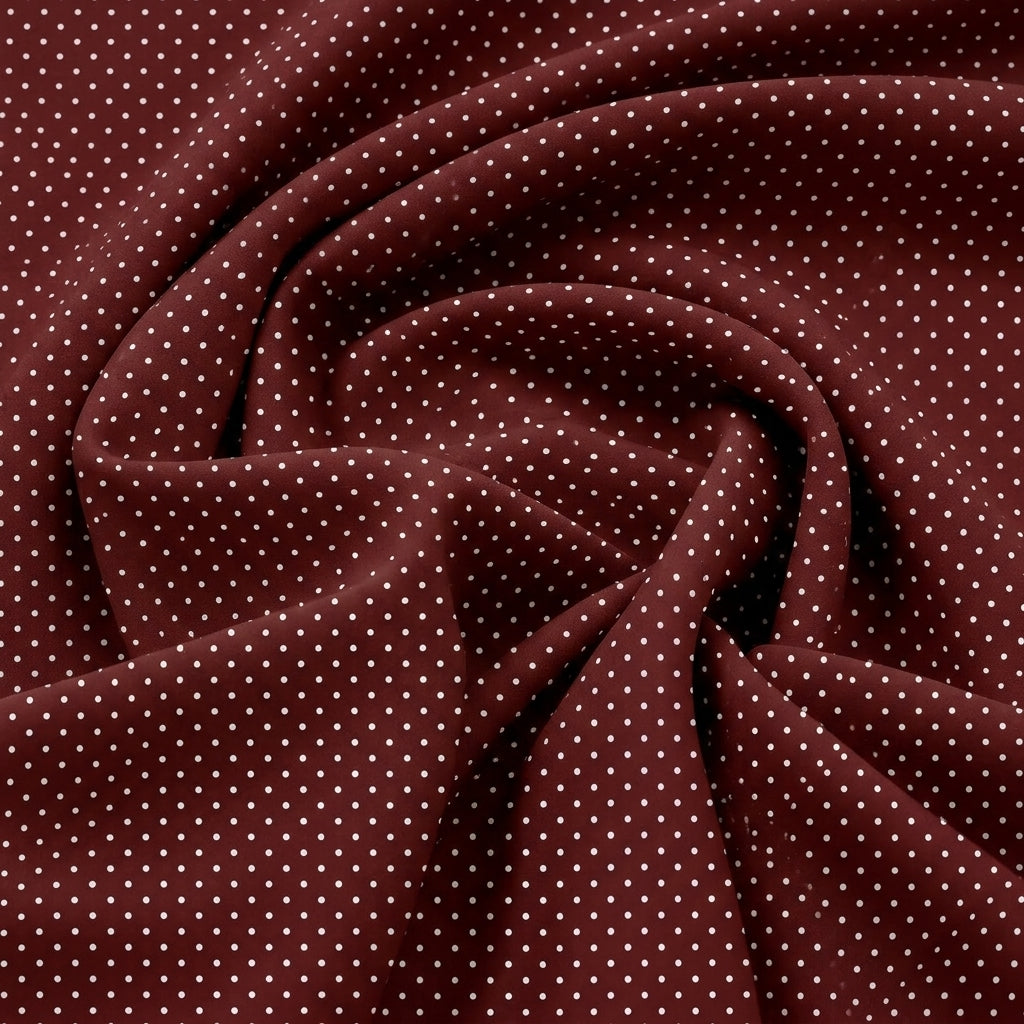 Swirled Brown Polka Dots Cotton Fabric Showing Drape