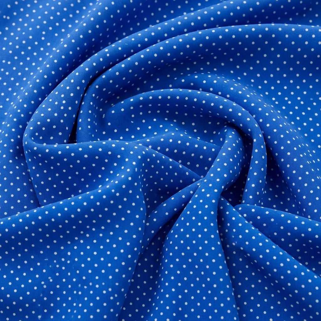 Swirled Blue Polka Dots Cotton Fabric Showing Drape