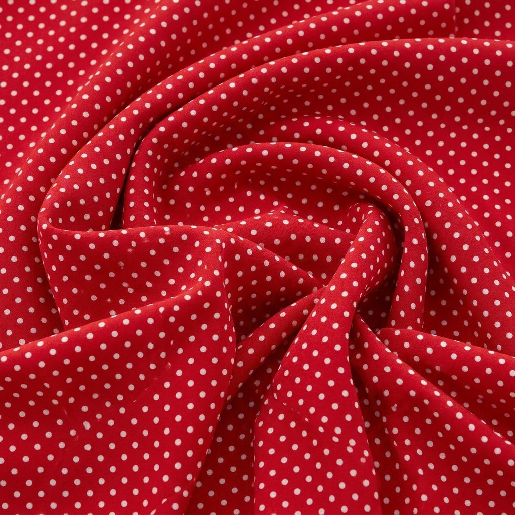 Swirled Red Polka Dots Cotton Fabric Showing Drape