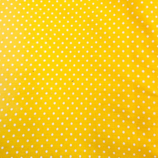 Yellow Polka Dots Cotton Fabric, laid flat