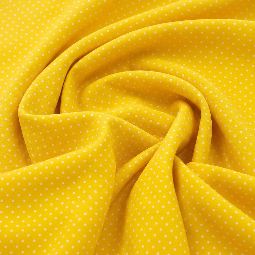 Swirled Yellow Polka Dots Cotton Fabric Showing Drape