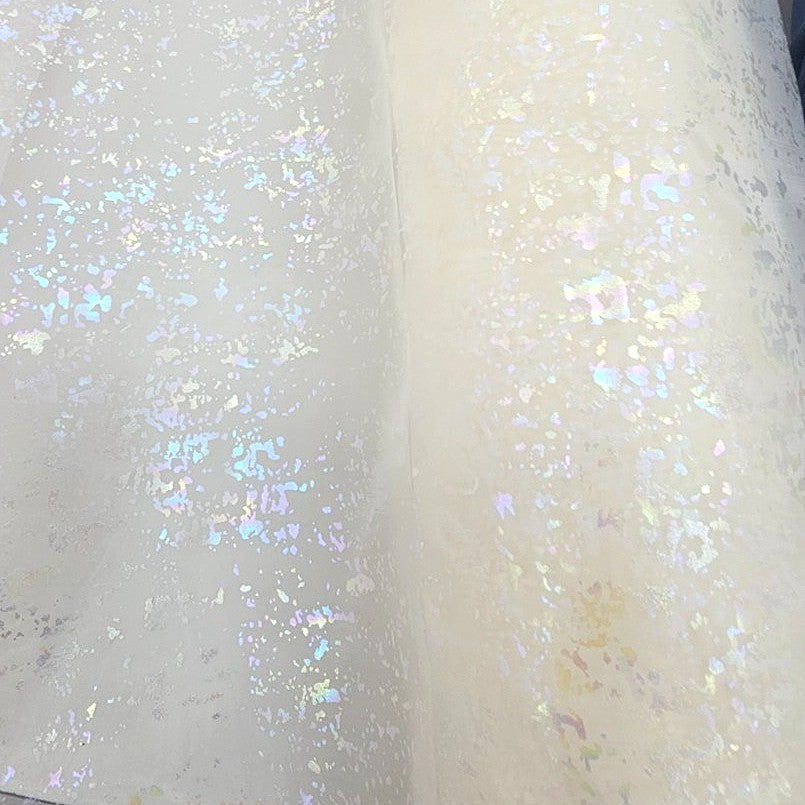 Cream Shimmer Tissue Fabric, laid flat