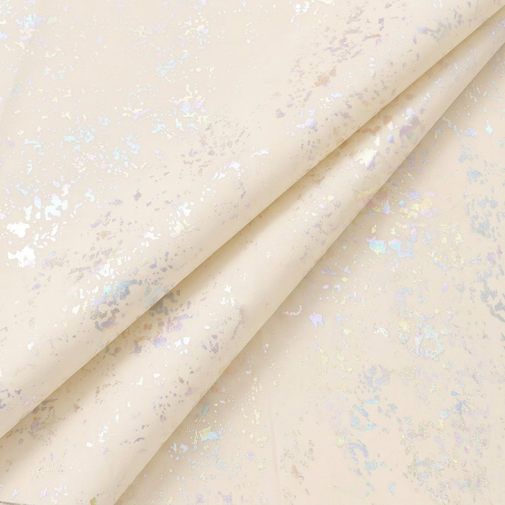 Folded Cream Shimmer Tissue Fabric