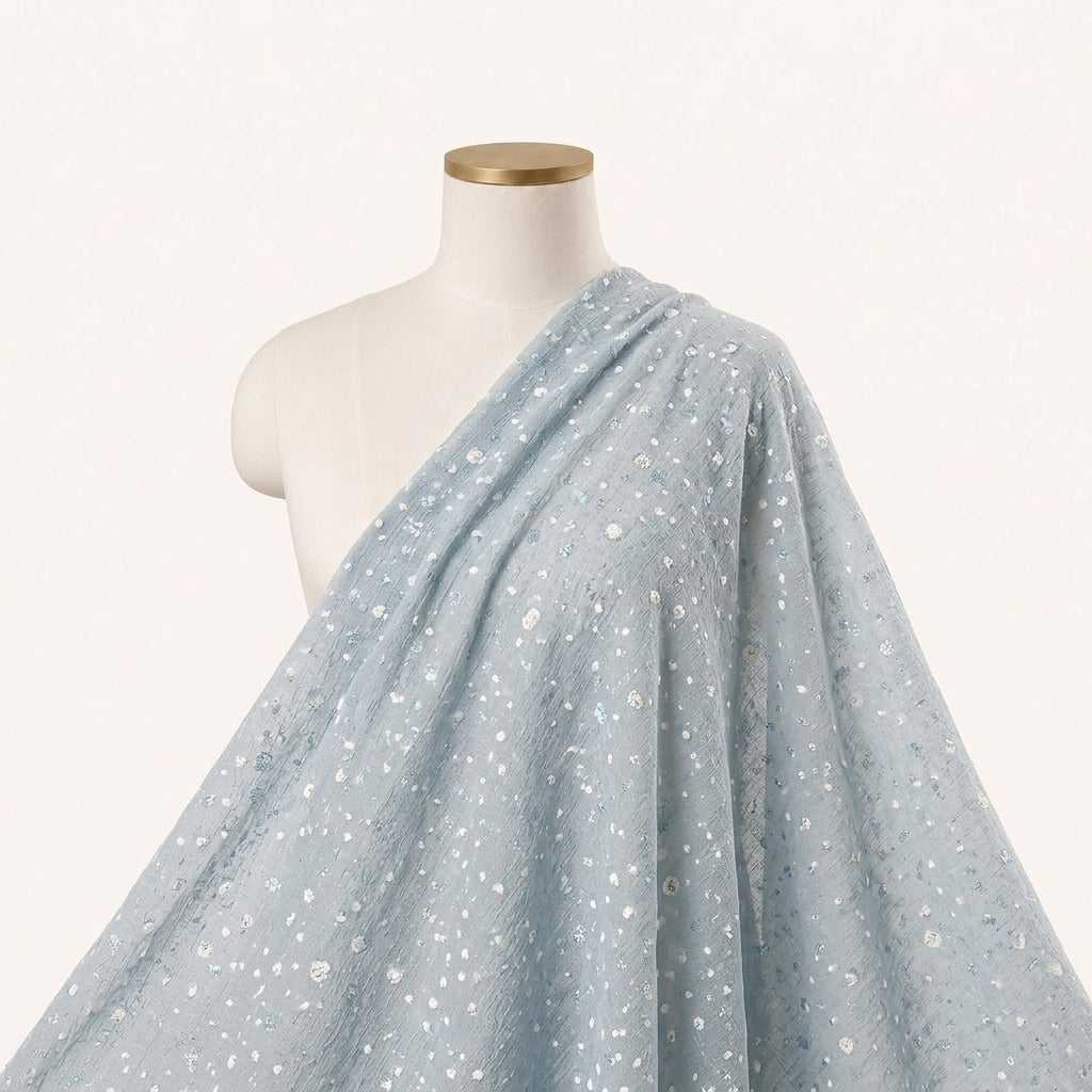 Light Blue Butta Organza Fabric Draped as a saree