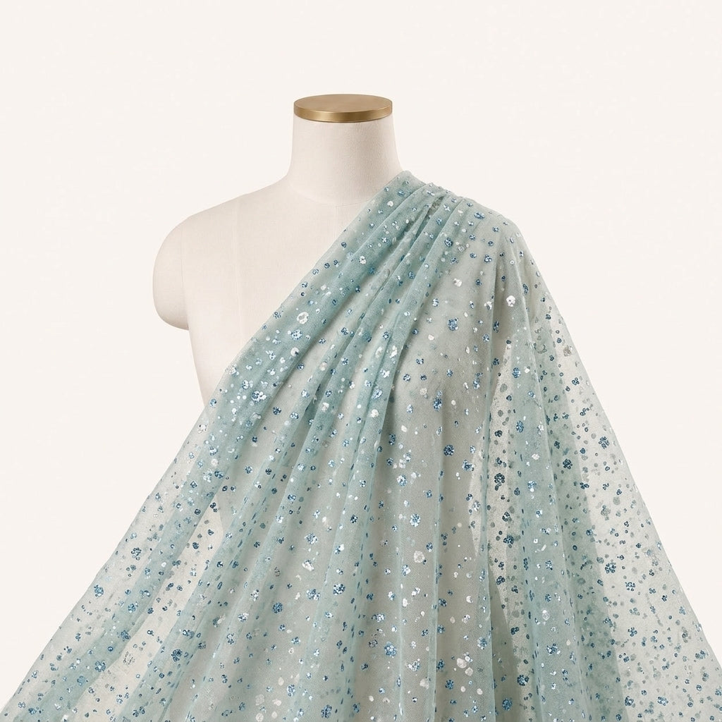 Green Butta Organza Fabric Draped as a saree