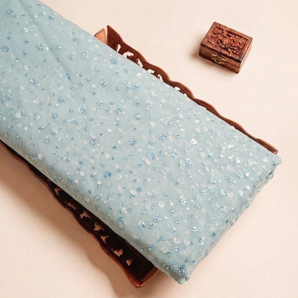 Green Butta Organza Fabric, folded
