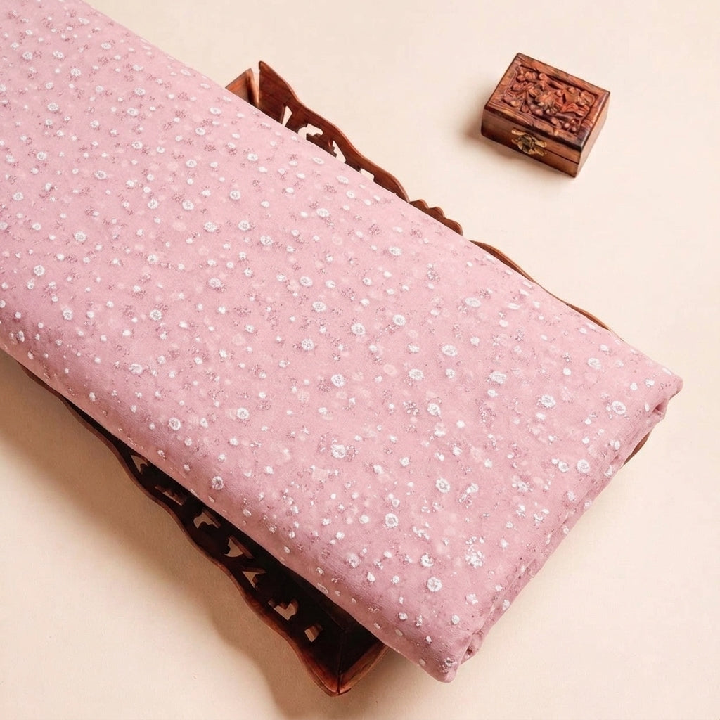 Folded Pink Butta Organza Fabric Highlighting Dusted Glitter and Texture