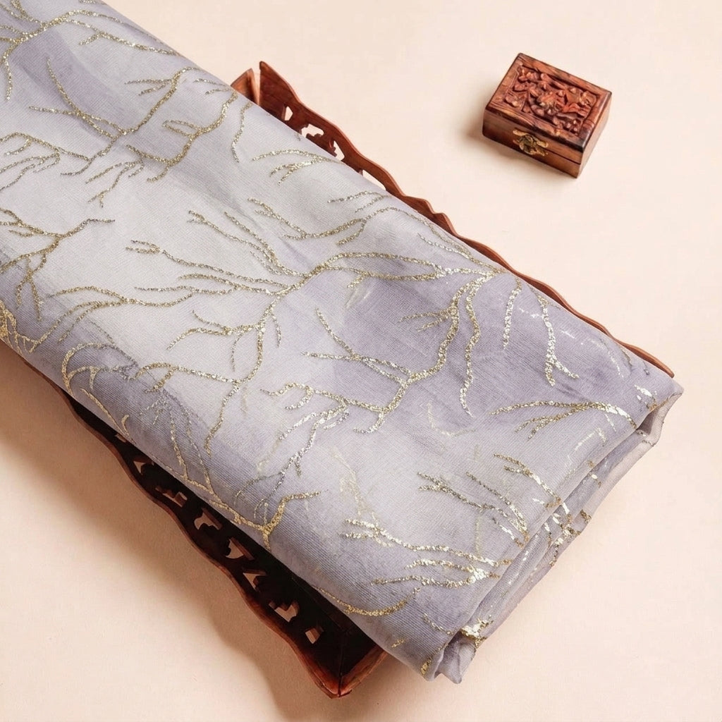 Folded Lavender Zari Organza Fabric Highlighting Texture