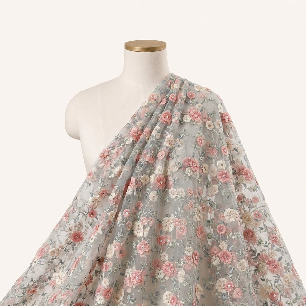 Peach Embroidery Net Fabric Draped as a saree