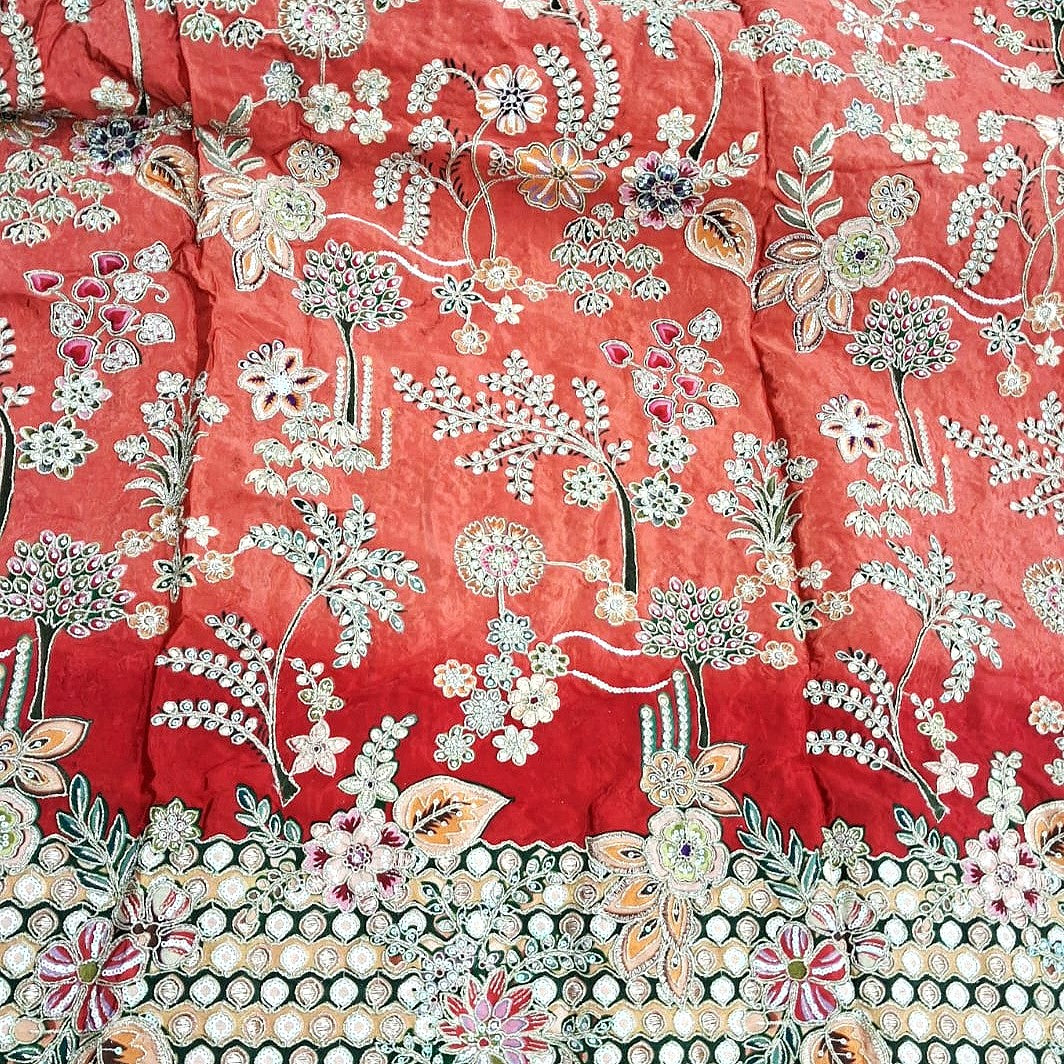 Red Embroidery Crepe Fabric, laid flat
