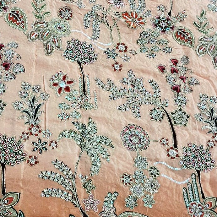 Peach Embroidery Crepe Fabric, laid flat