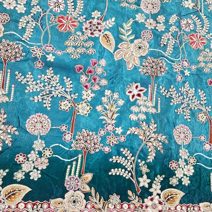 Blue Embroidery Crepe Fabric, laid flat