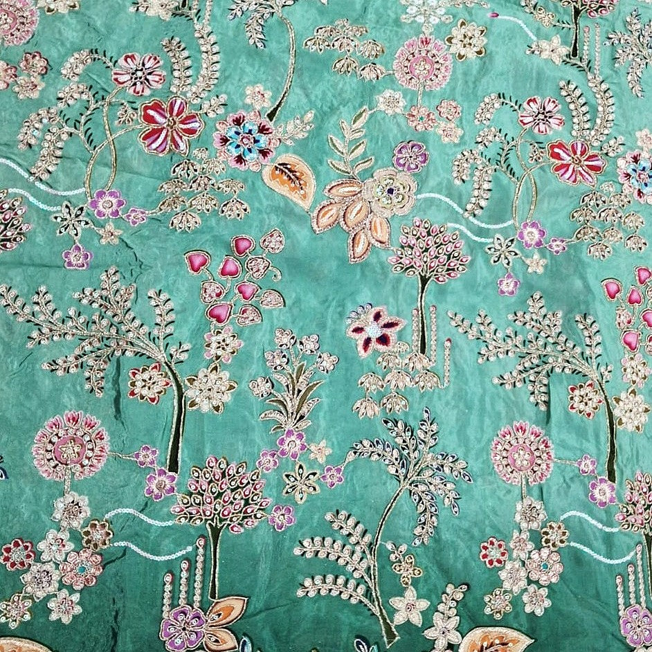 Green Embroidery Crepe Fabric, laid flat