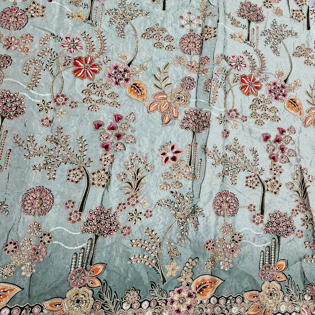 Green Embroidery Crepe Fabric, laid flat