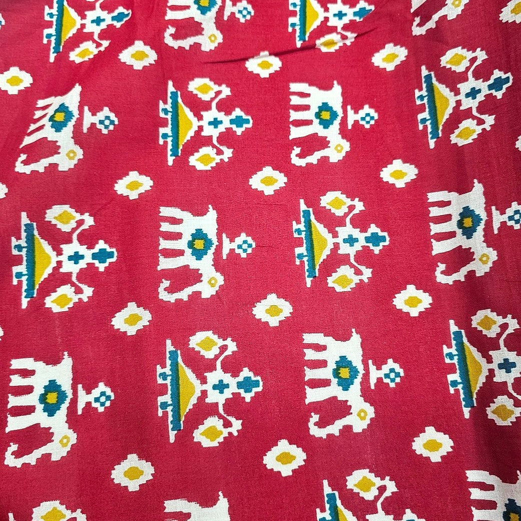 Maroon Patola Print Cotton Fabric, laid flat