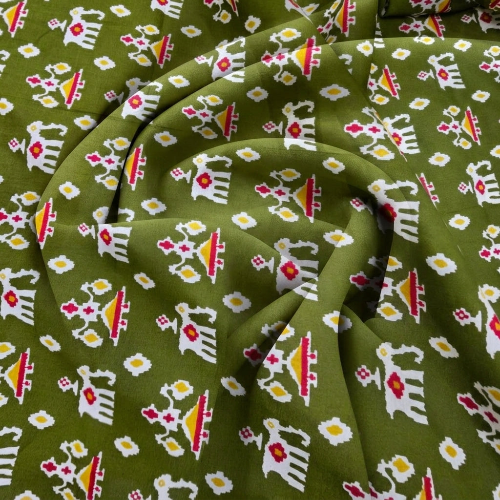 Swirled Green Patola Print Cotton Fabric Showing Drape
