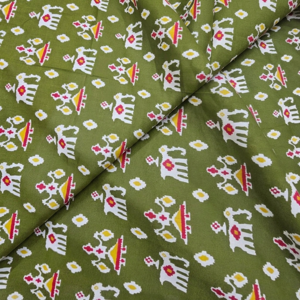 Folded Green Patola Print Cotton Fabric